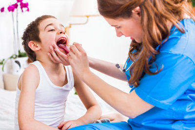 happy kid getting his health checked