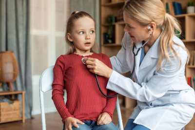 adorable kid getting her health checked