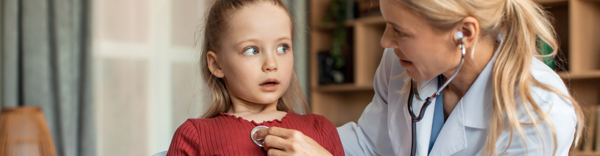 adorable kid getting her health checked